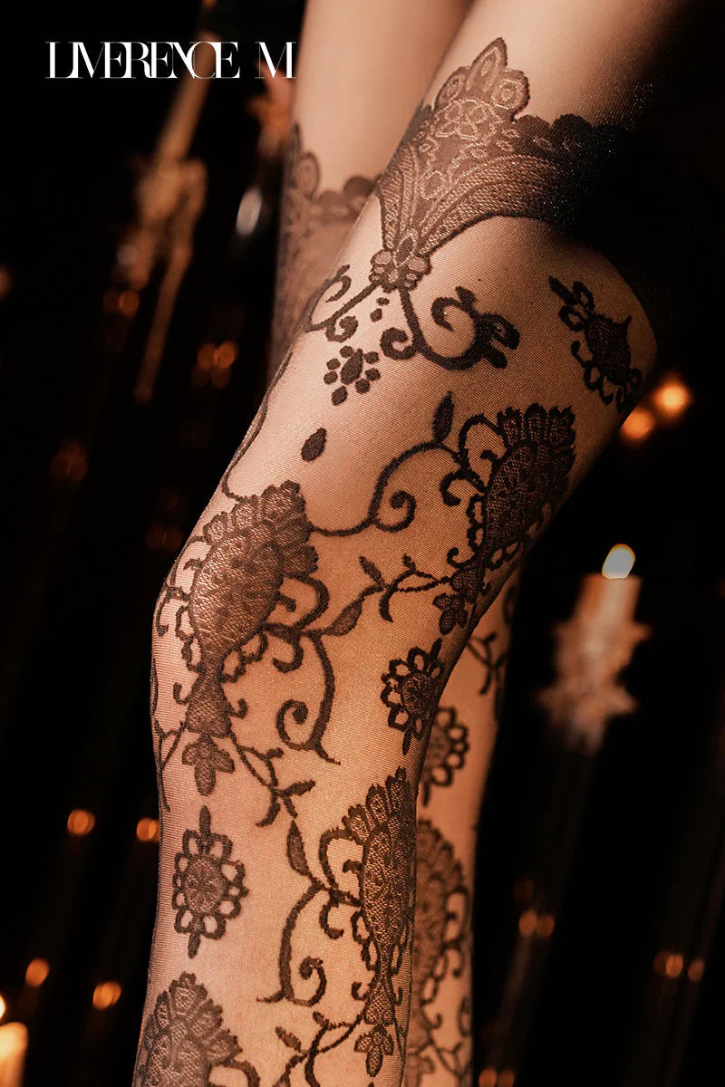 Close-up of the floral pattern on Baroque 15D black pantyhose