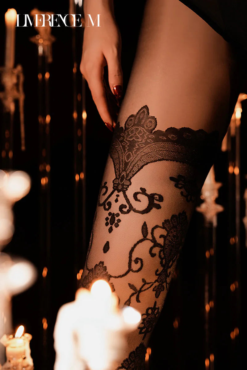 Standing close-up of Baroque 15D black floral embossed pantyhose
